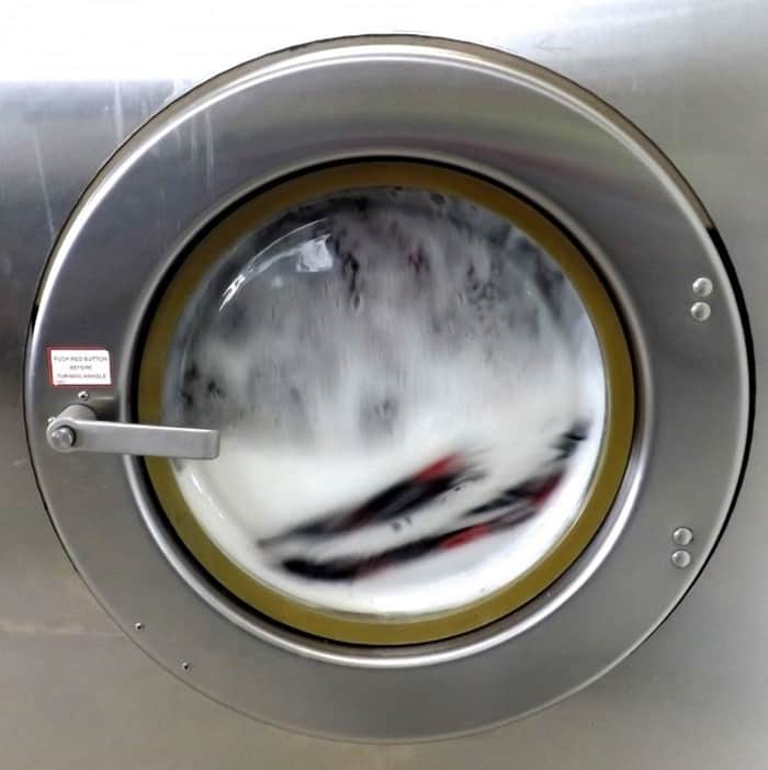 washing his vis clothes