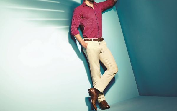 Maroon shirt with beige or cream jeans