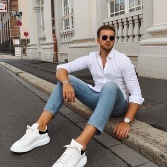 Classic white shirt and light blue jeans combo